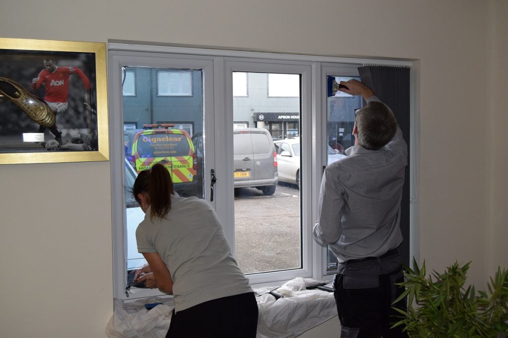 Commercial window film being applied