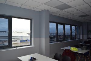 Rest room heat reduction window film installed on almost all eight windows