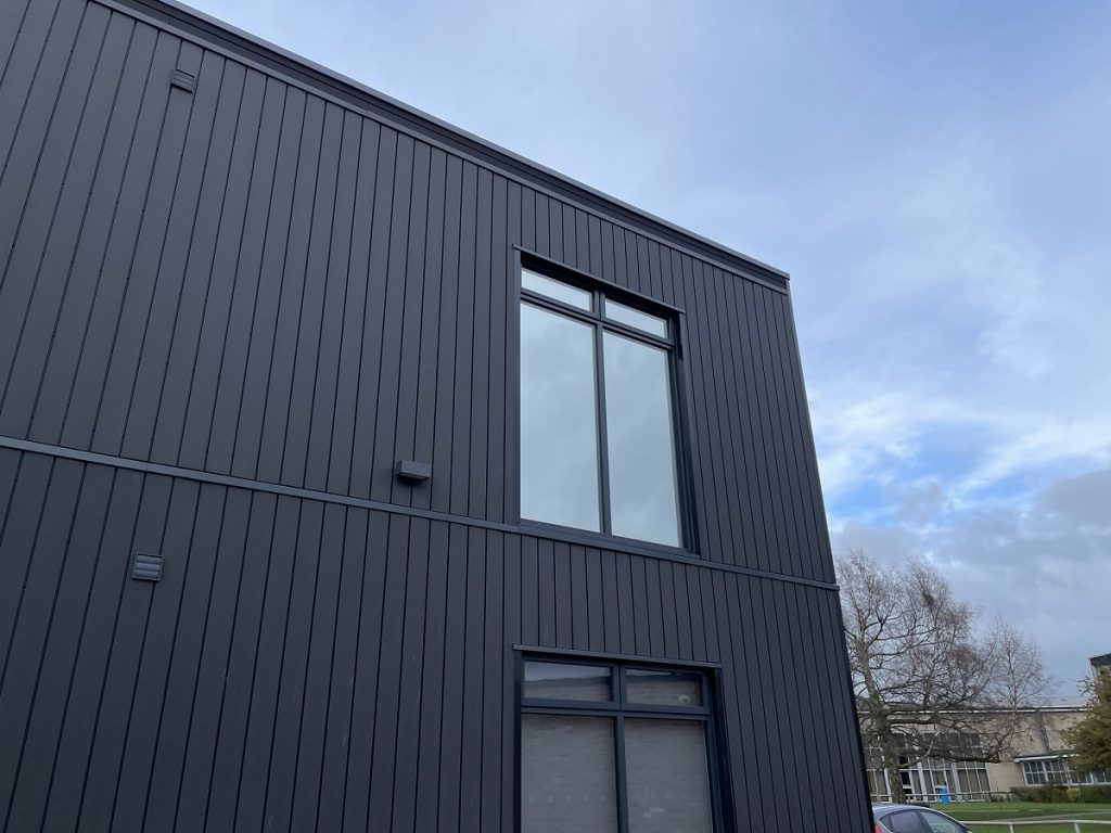 Close up shot of upstairs office windows completed